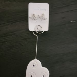 Beautiful White and Silver flowe 3 piece earrings.